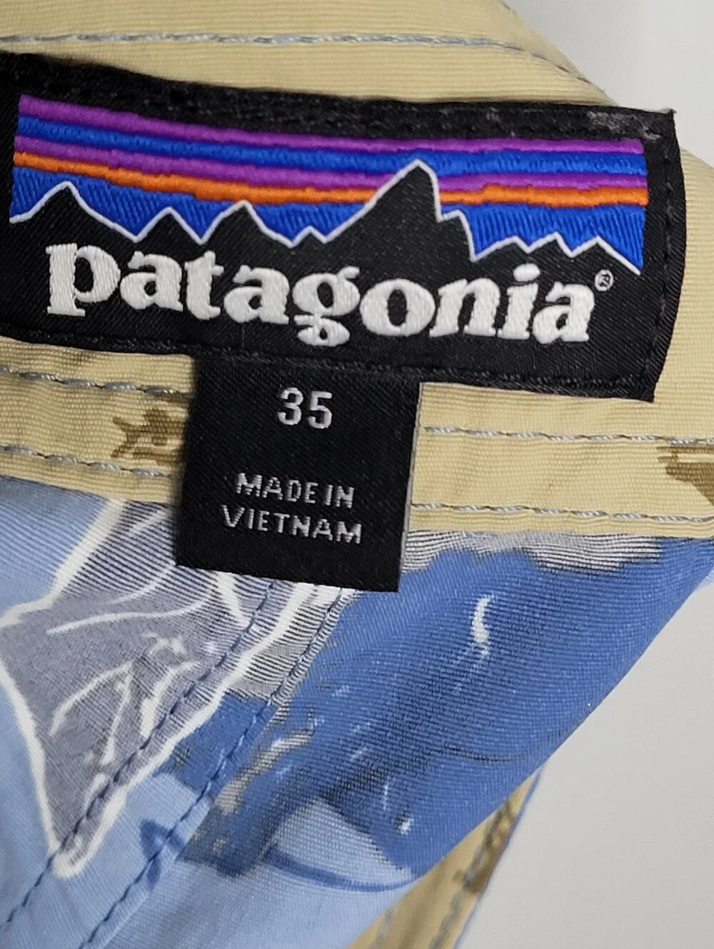 Patagonia Stretch Planing Floral Board Shorts Blue Yellow Mens 35 Surf Swim